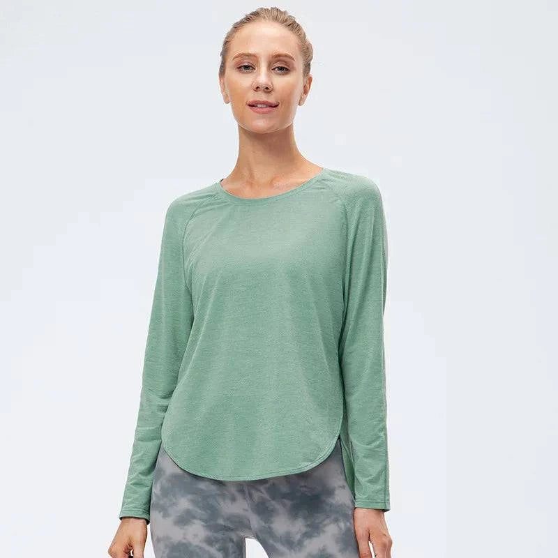 
                  
                    Naadloze Sporttop met Lange Mouwen – Plus-Size - SkinzLine
                  
                