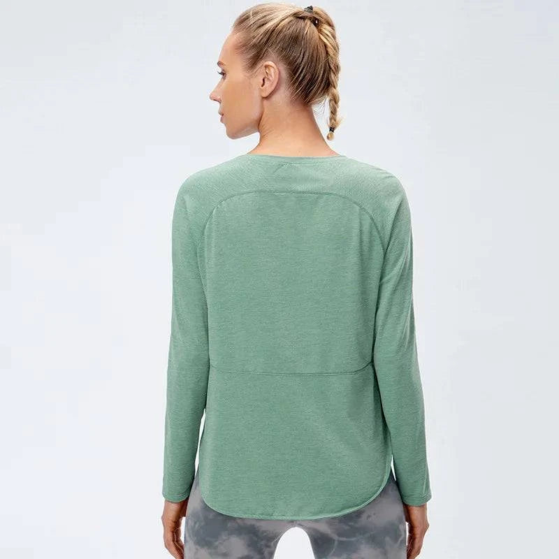 
                  
                    Naadloze Sporttop met Lange Mouwen – Plus-Size - SkinzLine
                  
                