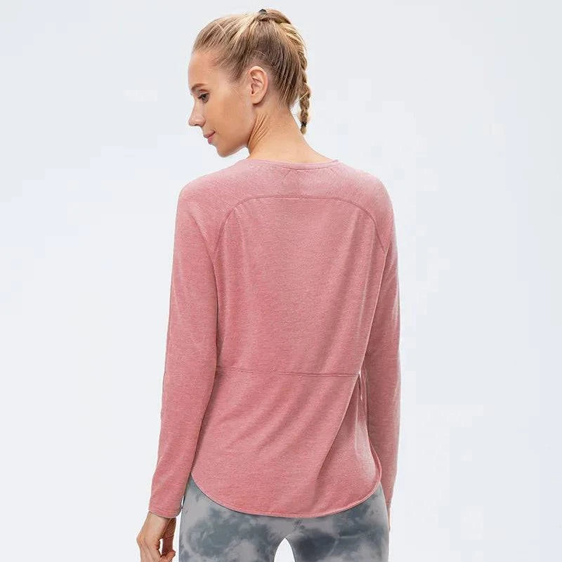 
                  
                    Naadloze Sporttop met Lange Mouwen – Plus-Size - SkinzLine
                  
                