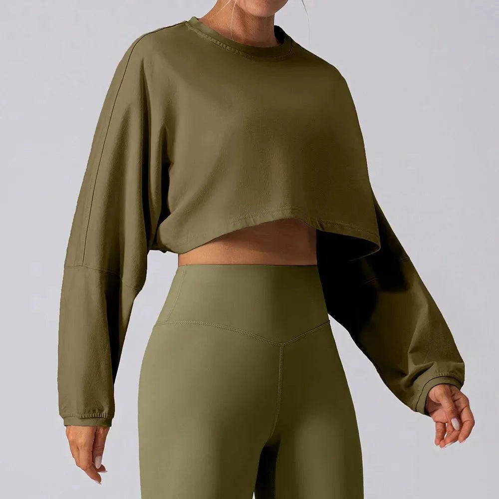 
                  
                    Oversized Sport Crop Top - Lange Mouwen, Ademend - SkinzLine
                  
                