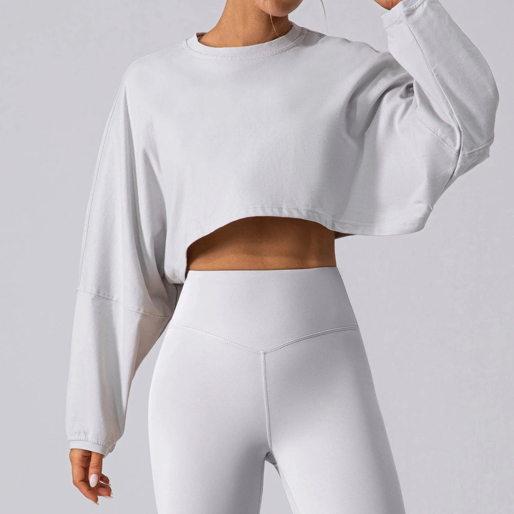 
                  
                    Oversized Sport Crop Top - Lange Mouwen, Ademend - SkinzLine
                  
                