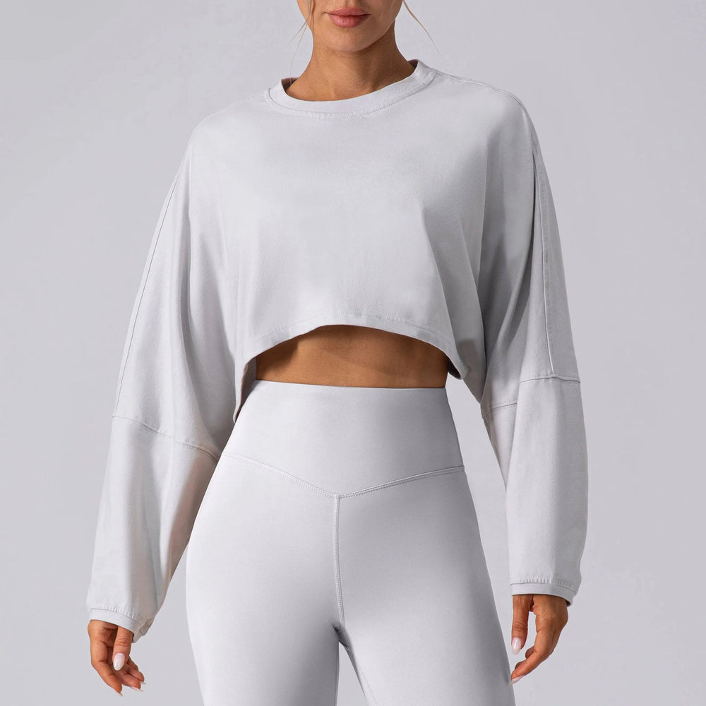 
                  
                    Oversized Sport Crop Top - Lange Mouwen, Ademend - SkinzLine
                  
                