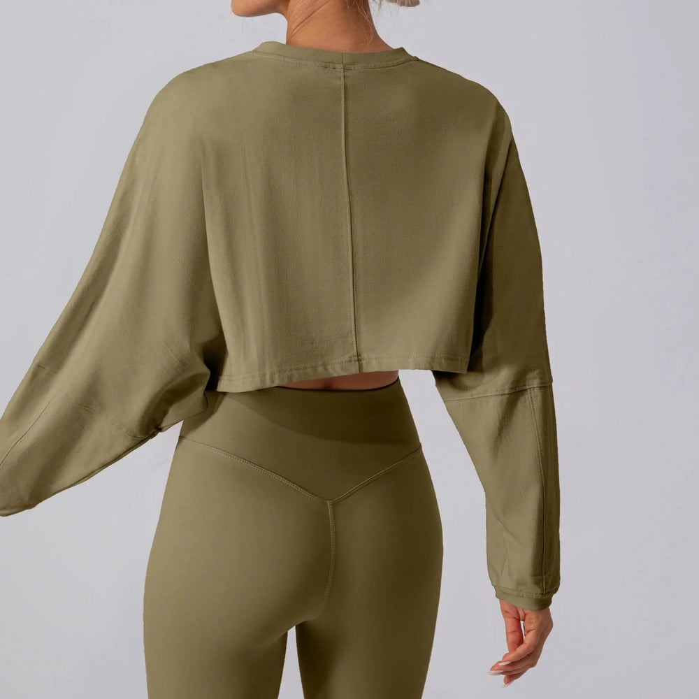 
                  
                    Oversized Sport Crop Top - Lange Mouwen, Ademend - SkinzLine
                  
                
