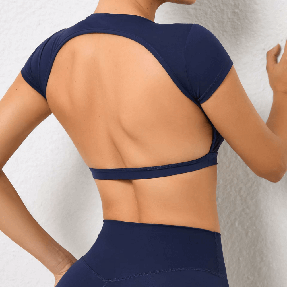 
                  
                    Dames Backless Yoga Crop Top – Ademend & Sneldrogend - SkinzLine
                  
                