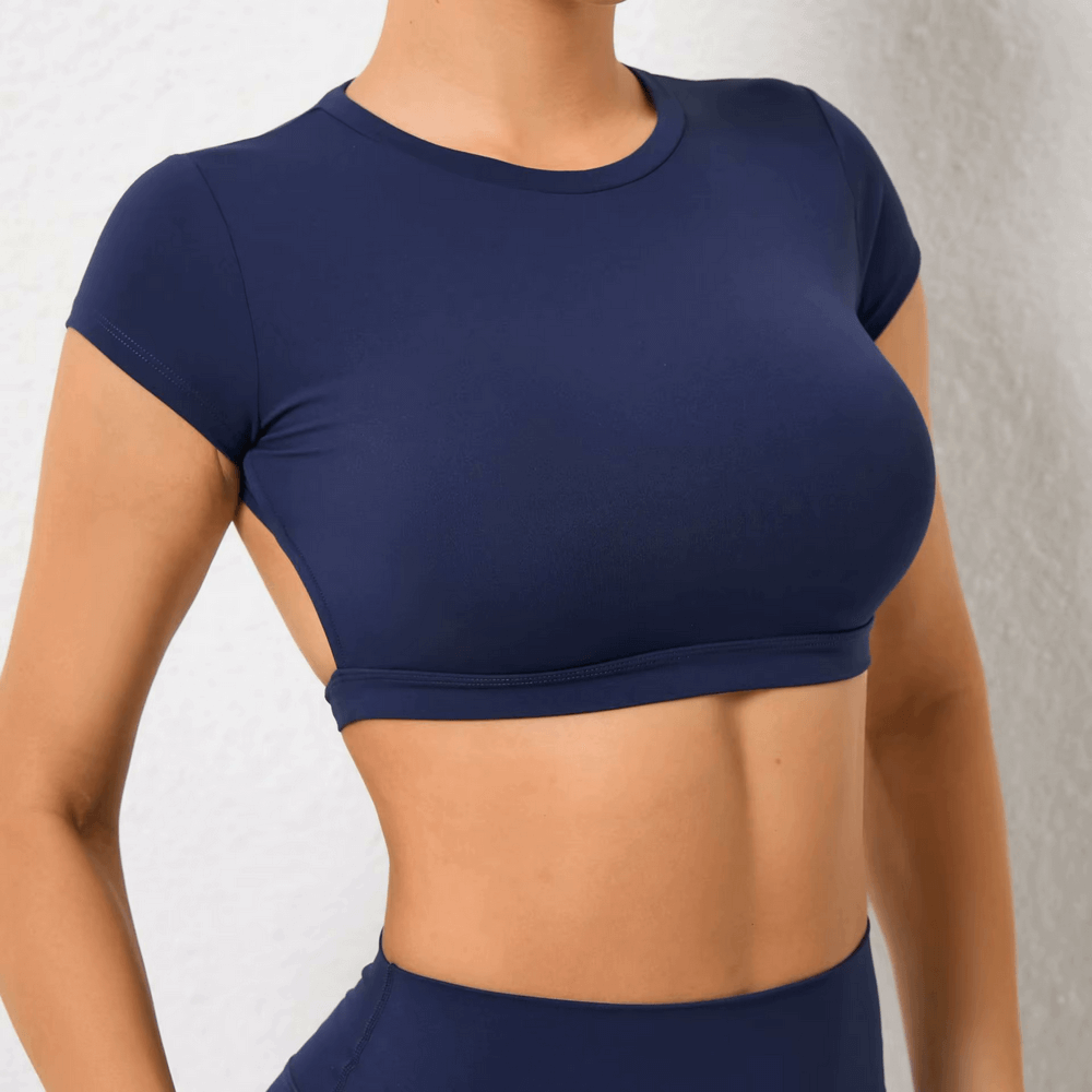 
                  
                    Dames Backless Yoga Crop Top – Ademend & Sneldrogend - SkinzLine
                  
                