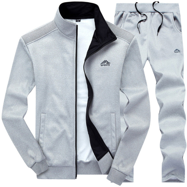 https://cdn.shopify.com/s/files/1/0659/5451/2986/files/stijlvol-gevoerd-heren-trainingspak-voorzijde-met-kraag-en-uitstekende-pasvorm-blauw-donkergrijs-of--1.jpg?v=1753581044