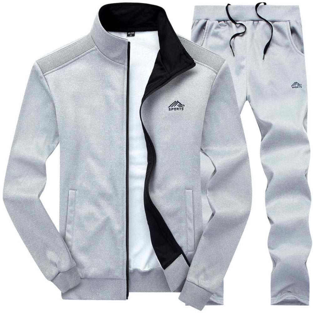 https://cdn.shopify.com/s/files/1/0659/5451/2986/files/stijlvol-gevoerd-heren-trainingspak-voorzijde-met-kraag-en-uitstekende-pasvorm-blauw-donkergrijs-of--2.jpg?v=1753581044