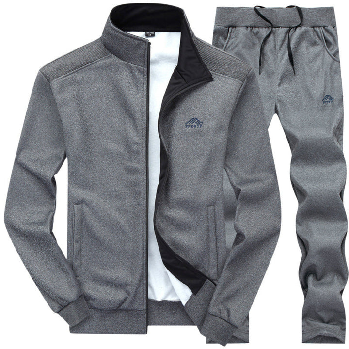 https://cdn.shopify.com/s/files/1/0659/5451/2986/files/stijlvol-gevoerd-heren-trainingspak-voorzijde-met-kraag-en-uitstekende-pasvorm-blauw-donkergrijs-of--3.jpg?v=1753581044