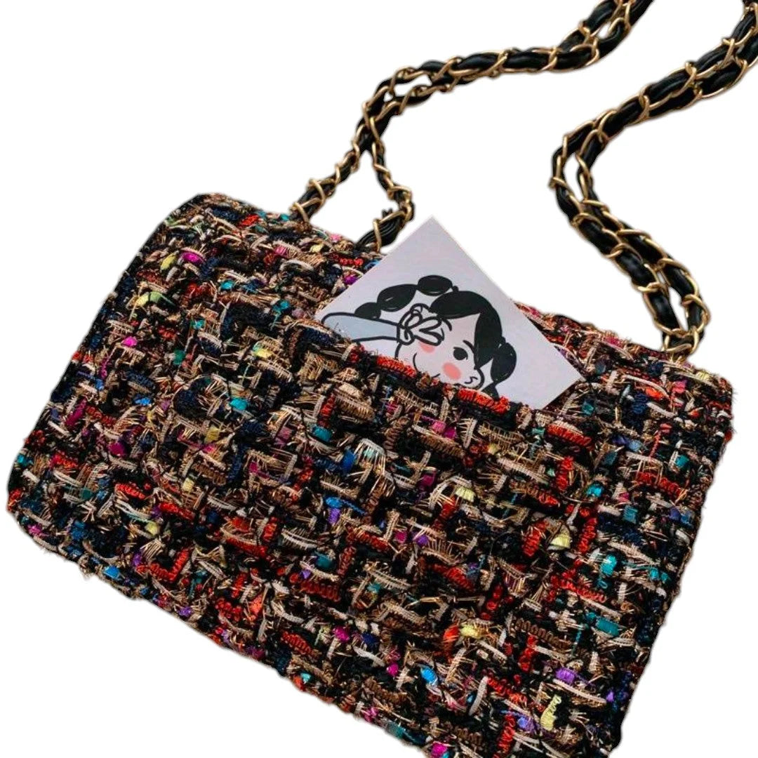 Schoudertas van tweed met kettingriem