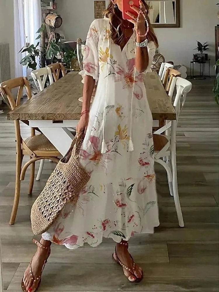 
                  
                    Isla - Lange Bohemien Jurk met Blad- en Streepmotieven - SkinzLine
                  
                