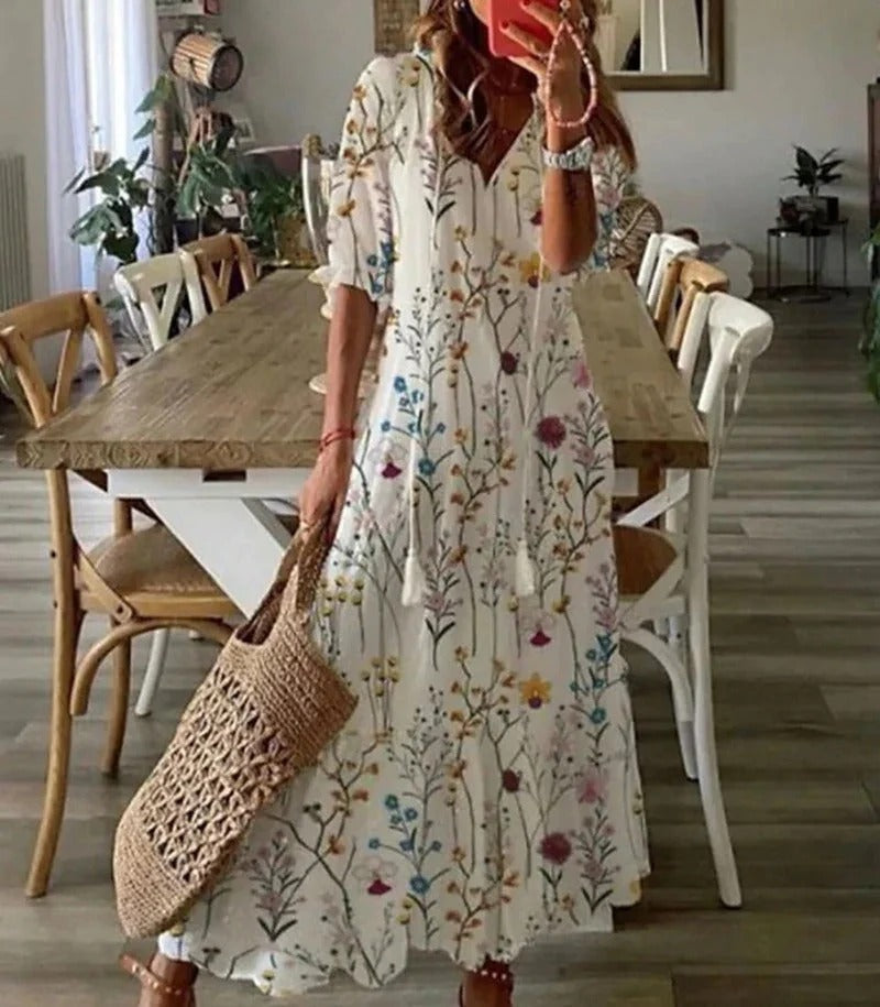 
                  
                    Isla - Lange Bohemien Jurk met Blad- en Streepmotieven - SkinzLine
                  
                