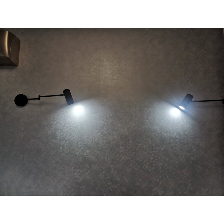 Wandlamp met zwenkarm en verstelbare kop als leeslamp