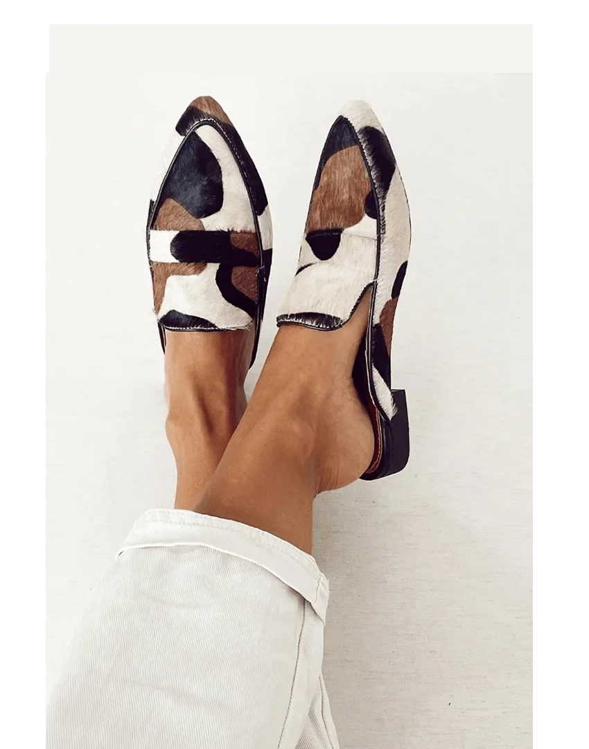 Dames mule loafers van koeienhuid met koeienprint