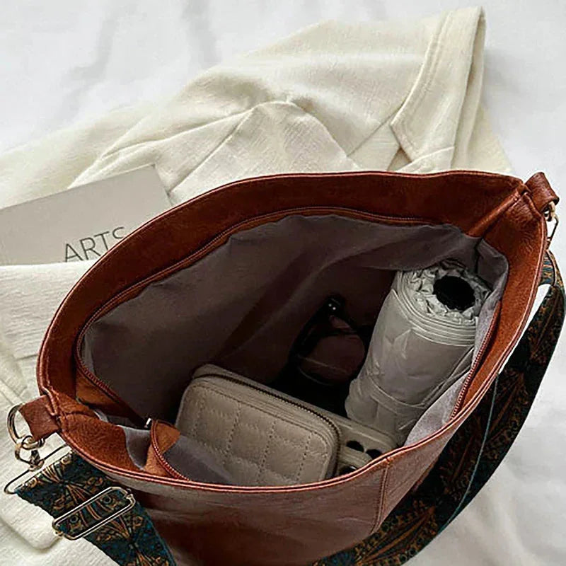 Hobo tas van imitatieleer met bohemien schouderband