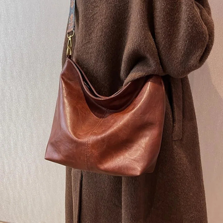 Hobo tas van imitatieleer met bohemien schouderband