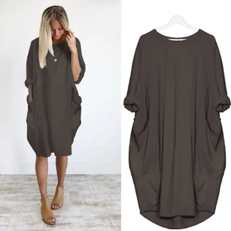 Oversized midi-jurk met 3/4 mouwen en plakzakken