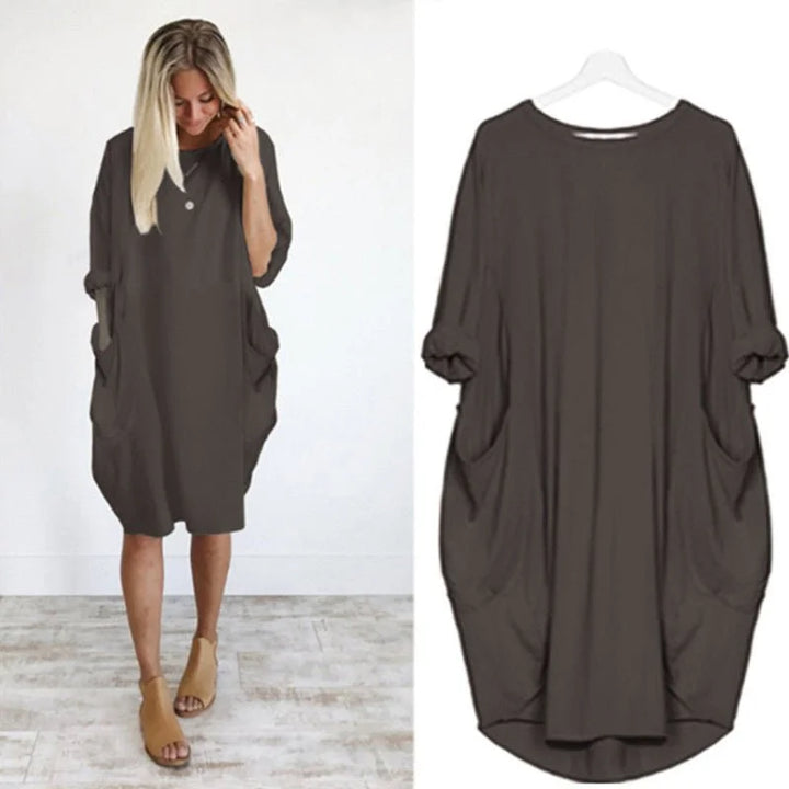 Oversized midi-jurk met 3/4 mouwen en plakzakken