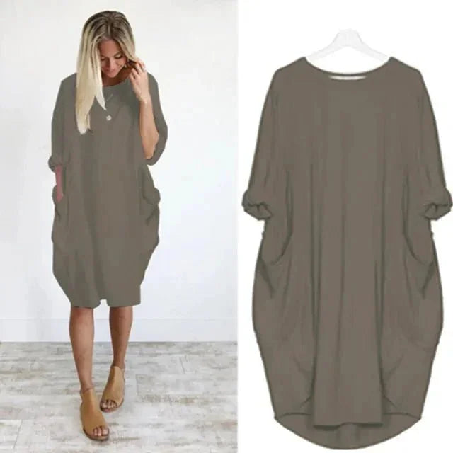Oversized midi-jurk met 3/4 mouwen en plakzakken