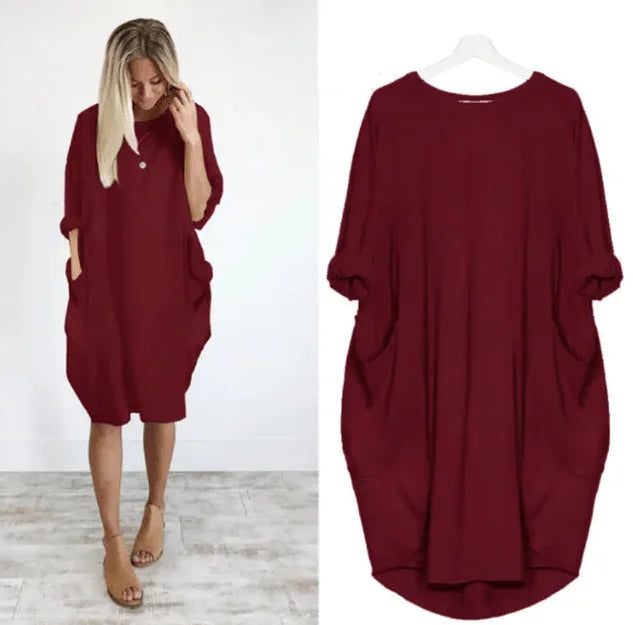Oversized midi-jurk met 3/4 mouwen en plakzakken