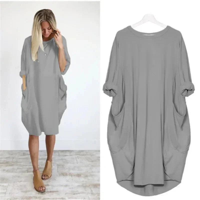 Oversized midi-jurk met 3/4 mouwen en plakzakken