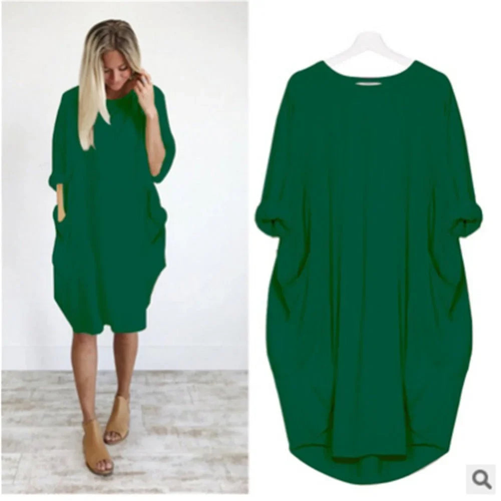 Oversized midi-jurk met 3/4 mouwen en plakzakken