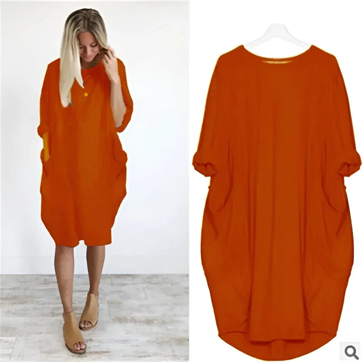 Oversized midi-jurk met 3/4 mouwen en plakzakken