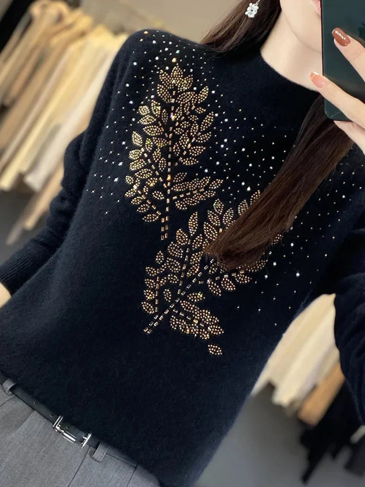 Trui met col, bladpatroon en strass