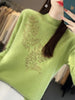 Trui met col, bladpatroon en strass