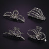 Dames Halloween haarklemmen met skeletvinger vleermuisvleugel en spinnenweb metalen decoratief ontwerp