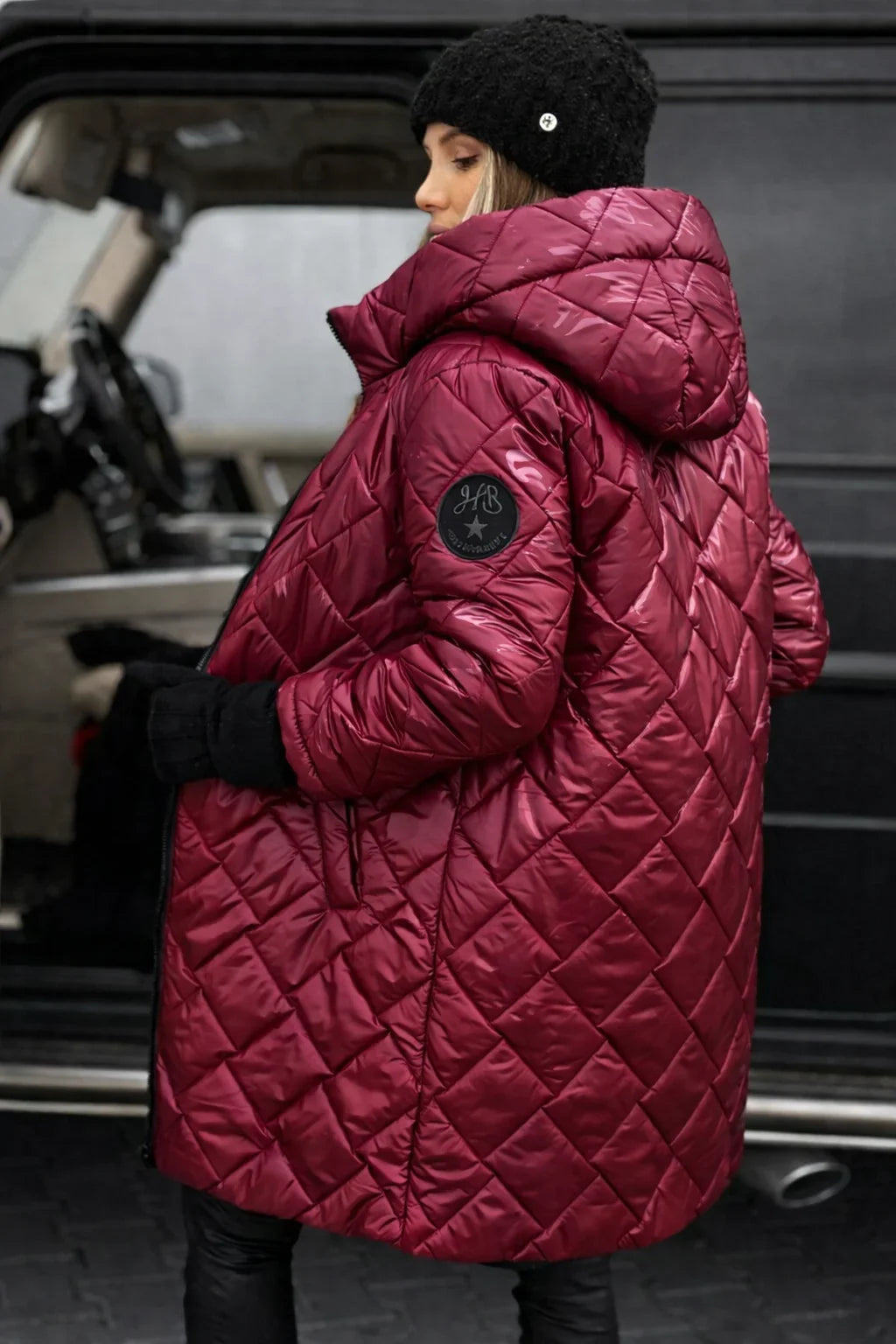 Lange gewatteerde puffer jas met capuchon en metallic finish