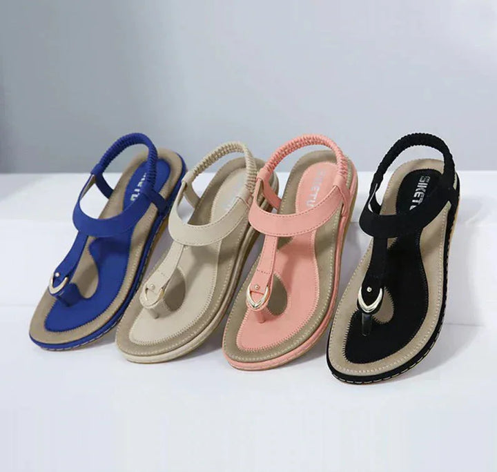 Platte T-strap sandalen met steunzool
