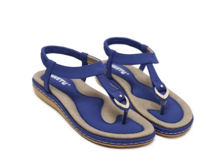 Platte T-strap sandalen met steunzool