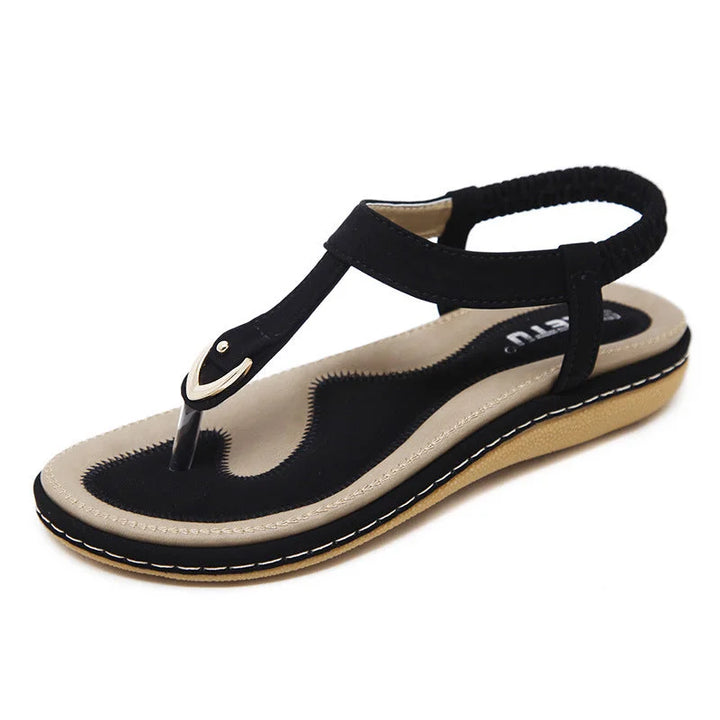 Platte T-strap sandalen met steunzool