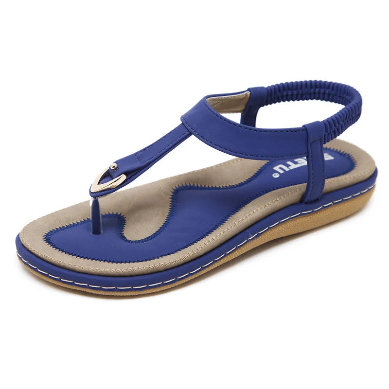 Platte T-strap sandalen met steunzool