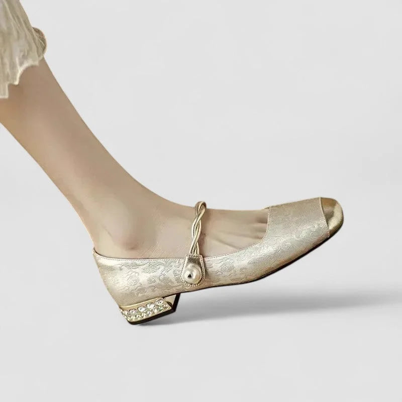 Gepatroonde Mary Jane-schoenen met gouden neus en blokhak