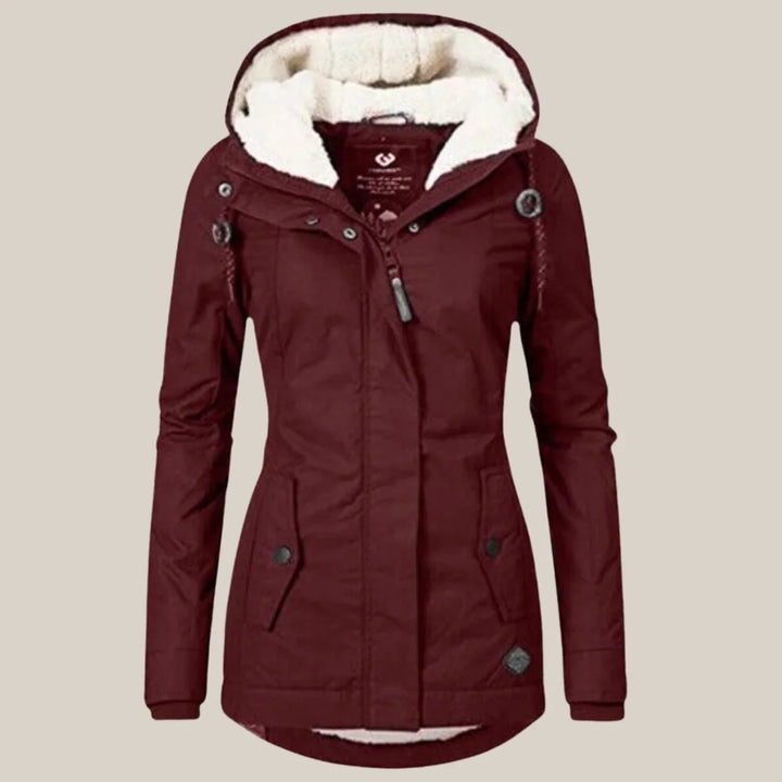 Gewatteerde winterjas met sherpa voering en capuchon