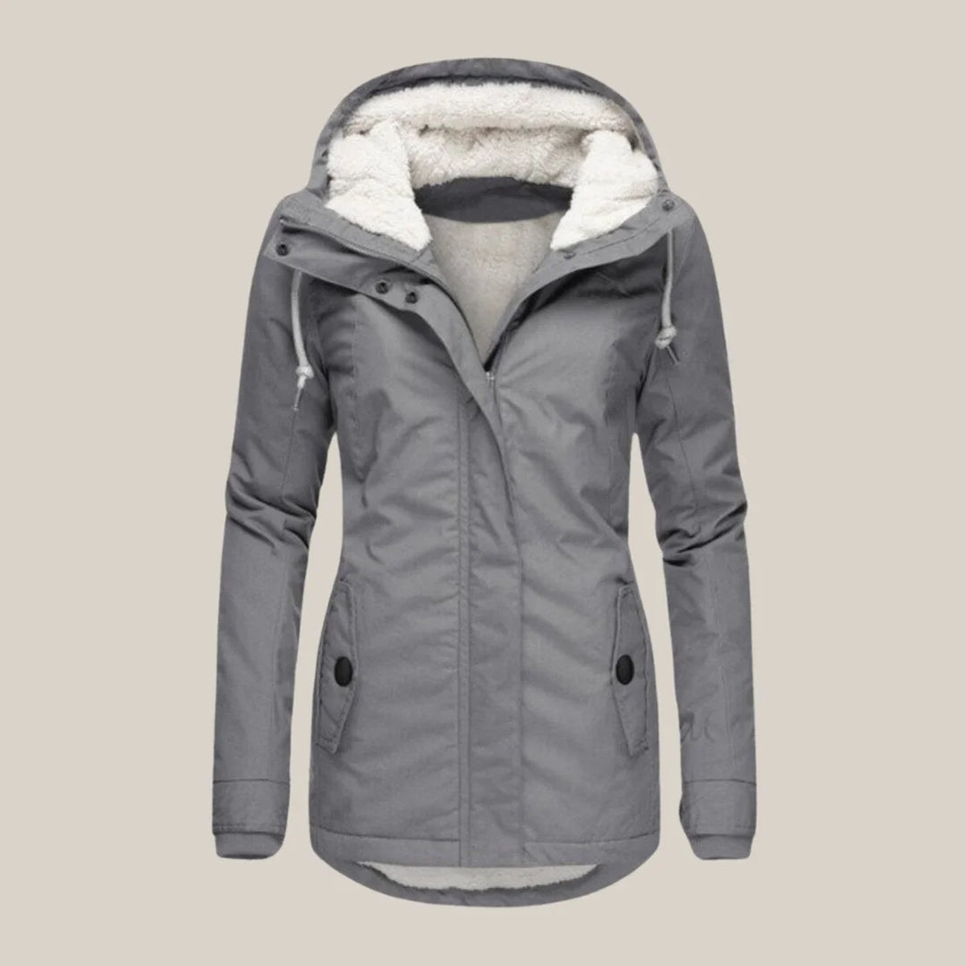 Gewatteerde winterjas met sherpa voering en capuchon