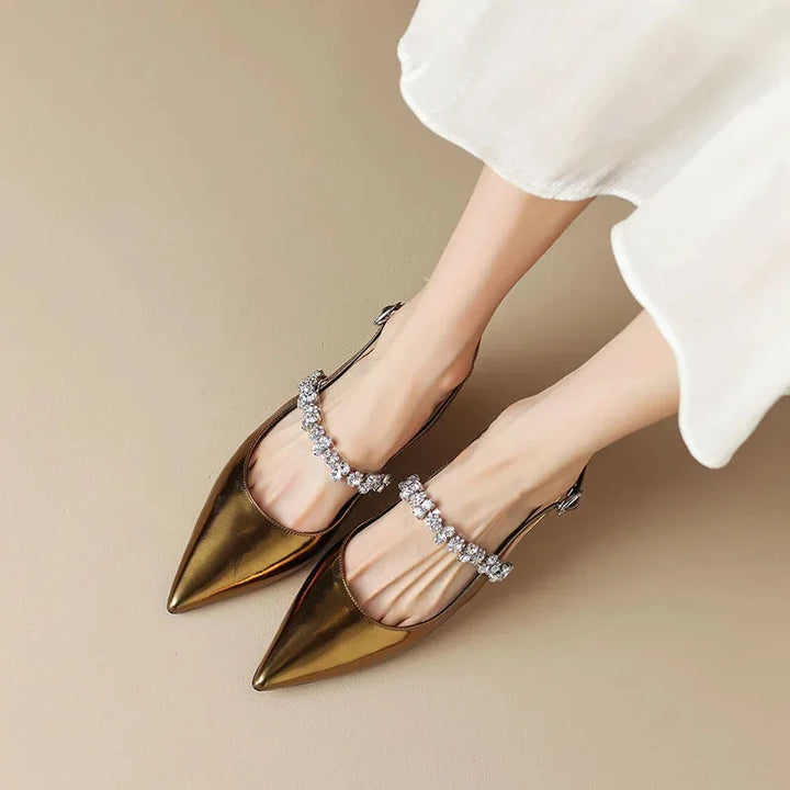 Slingback pumps met puntneus en kristallen bandje